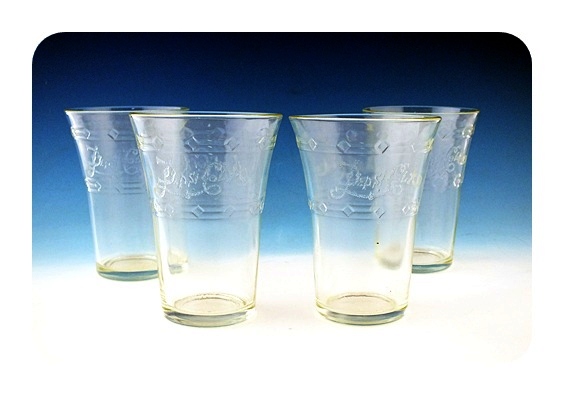 Four vintage Pepsi Cola glasses