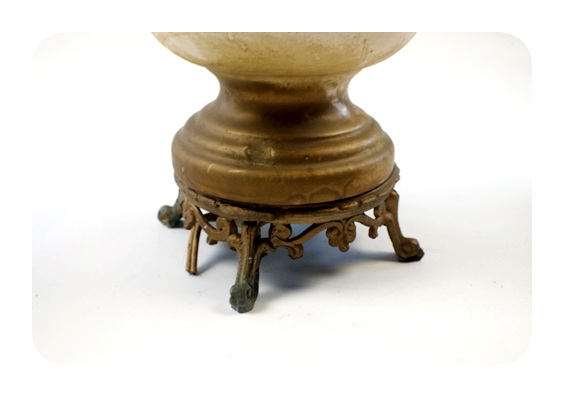 Vintage glass lamp that has been transformed into a decorative vase