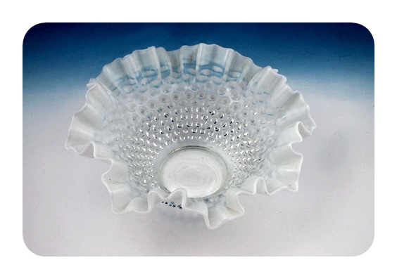 Opalescent hobnail bowl with ruffled edges