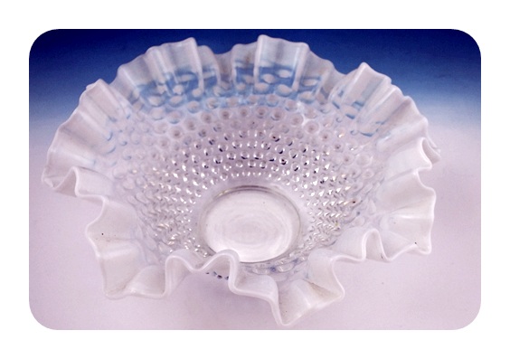 Opalescent hobnail bowl with ruffled edges