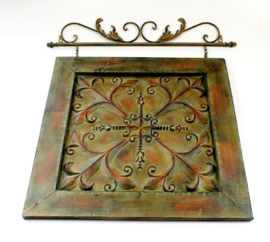 Metal artistic wall hanging with applied antique style finish