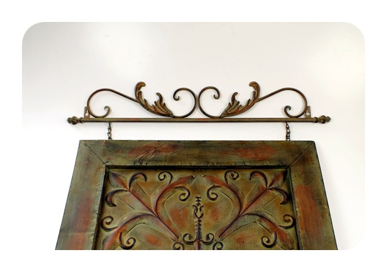 Metal artistic wall hanging with applied antique style finish