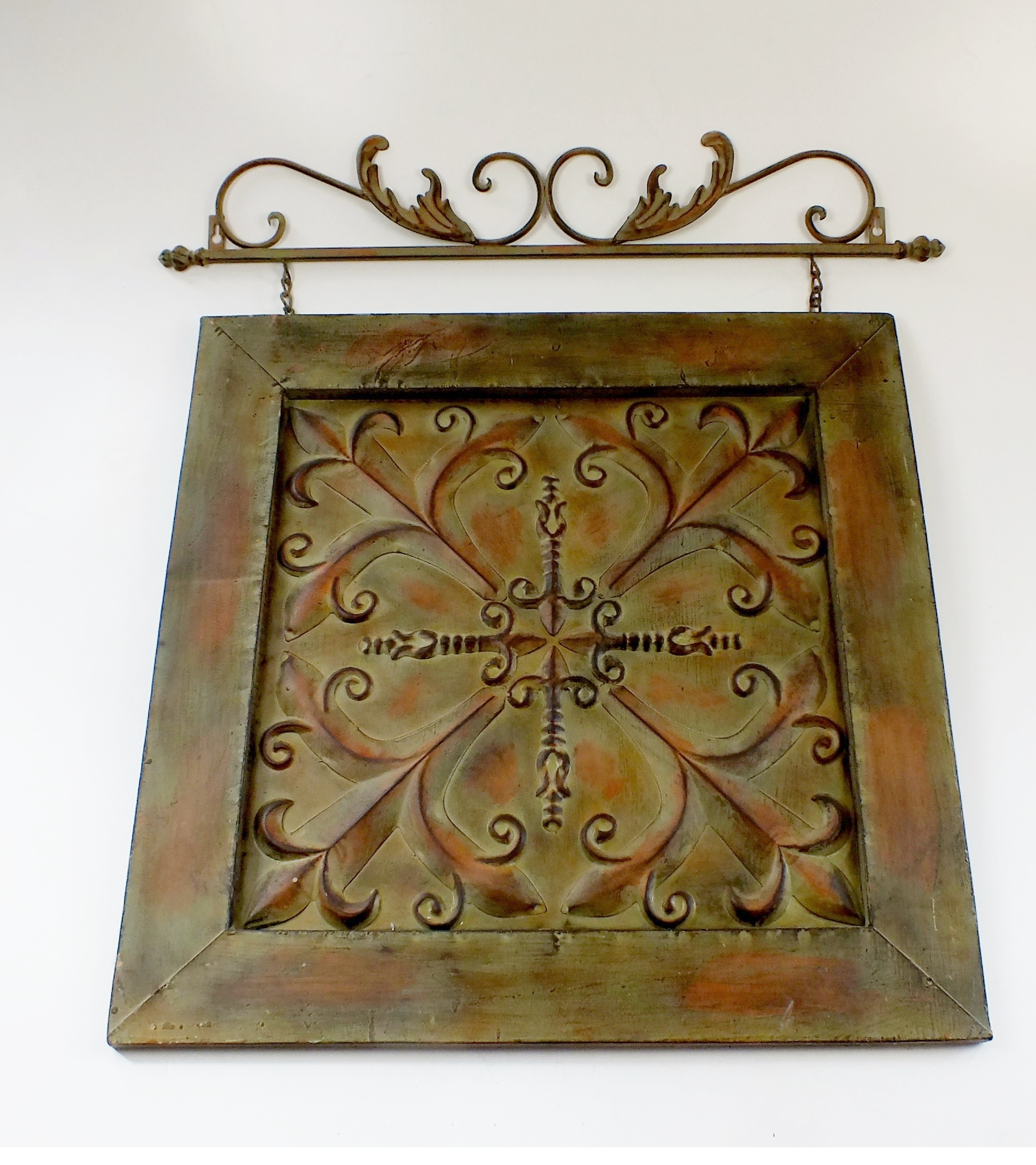 Metal artistic wall hanging with applied antique style finish