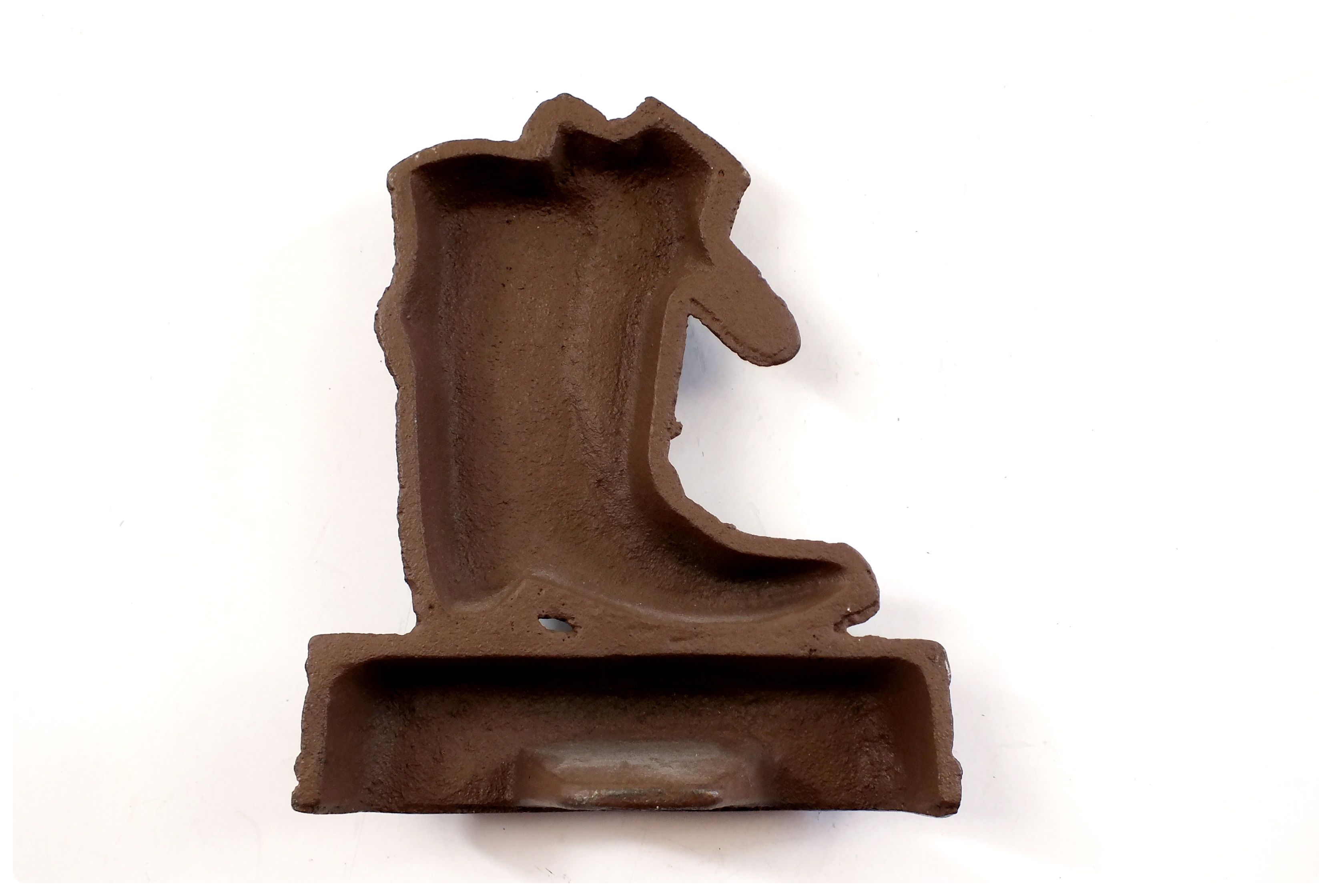 Cast metal Southwestern style door stop