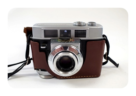 Pair of vintage cameras featuring the Polaroid Automatic 250 Land Camera and more