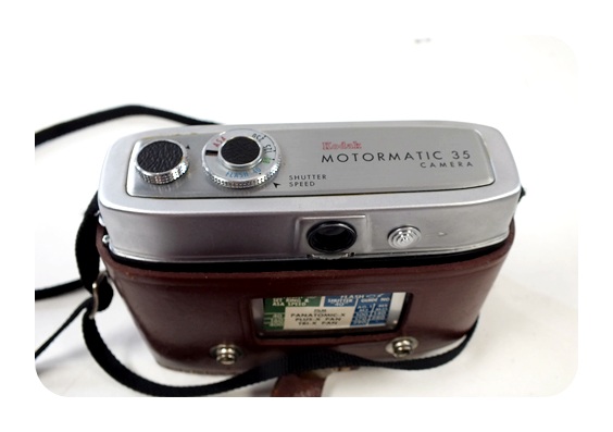 Pair of vintage cameras featuring the Polaroid Automatic 250 Land Camera and more