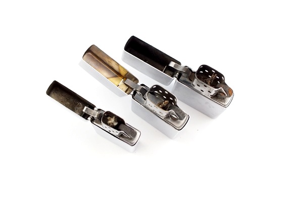 Lot of three Zippo lighters in fair condition