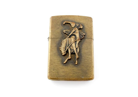 Pair of vintage solid brass Zippo lighters with Marlboro cowboy on horse