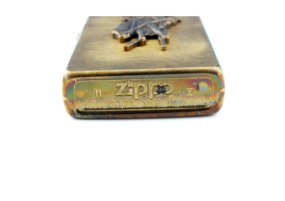 Pair of vintage solid brass Zippo lighters with Marlboro cowboy on horse