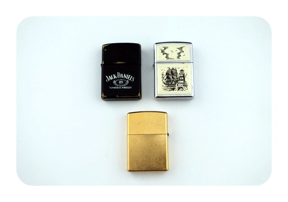 Lot of three vintage Zippo lighters to include a Jack Daniels and more