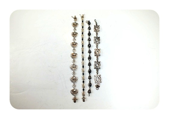 Four ornate sterling bracelets