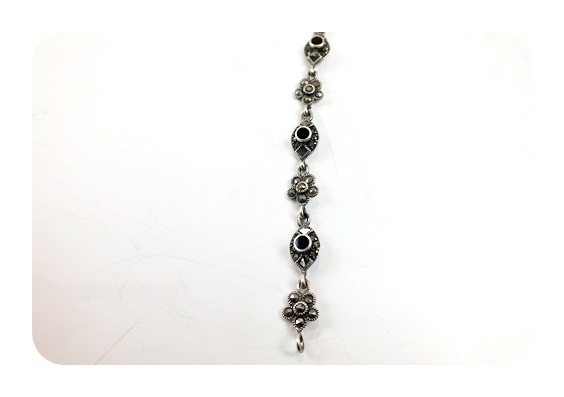 Four ornate sterling bracelets