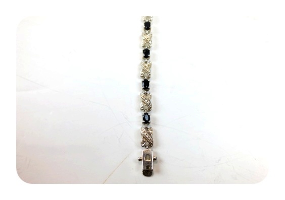 Four ornate sterling bracelets