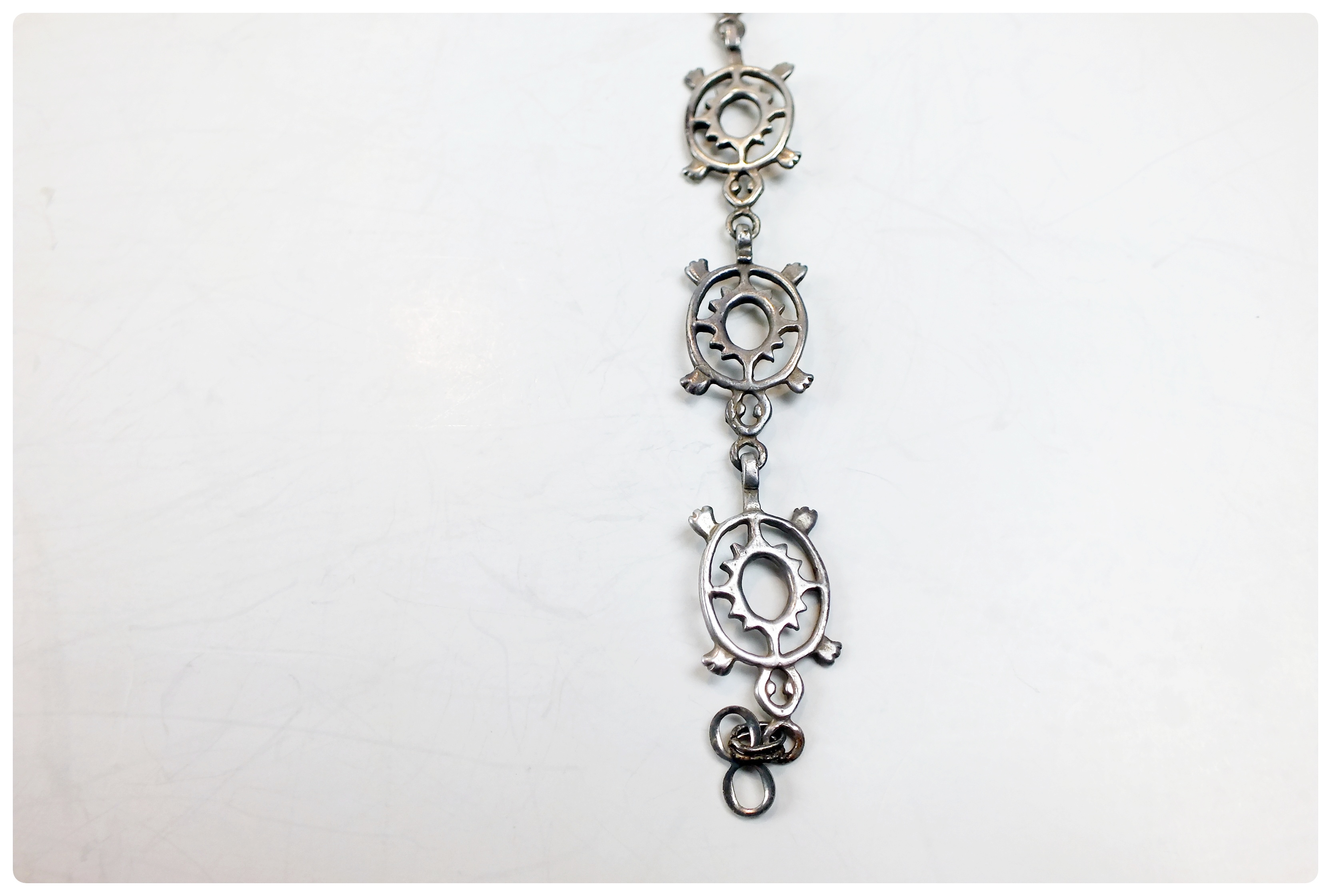 Four ornate sterling bracelets