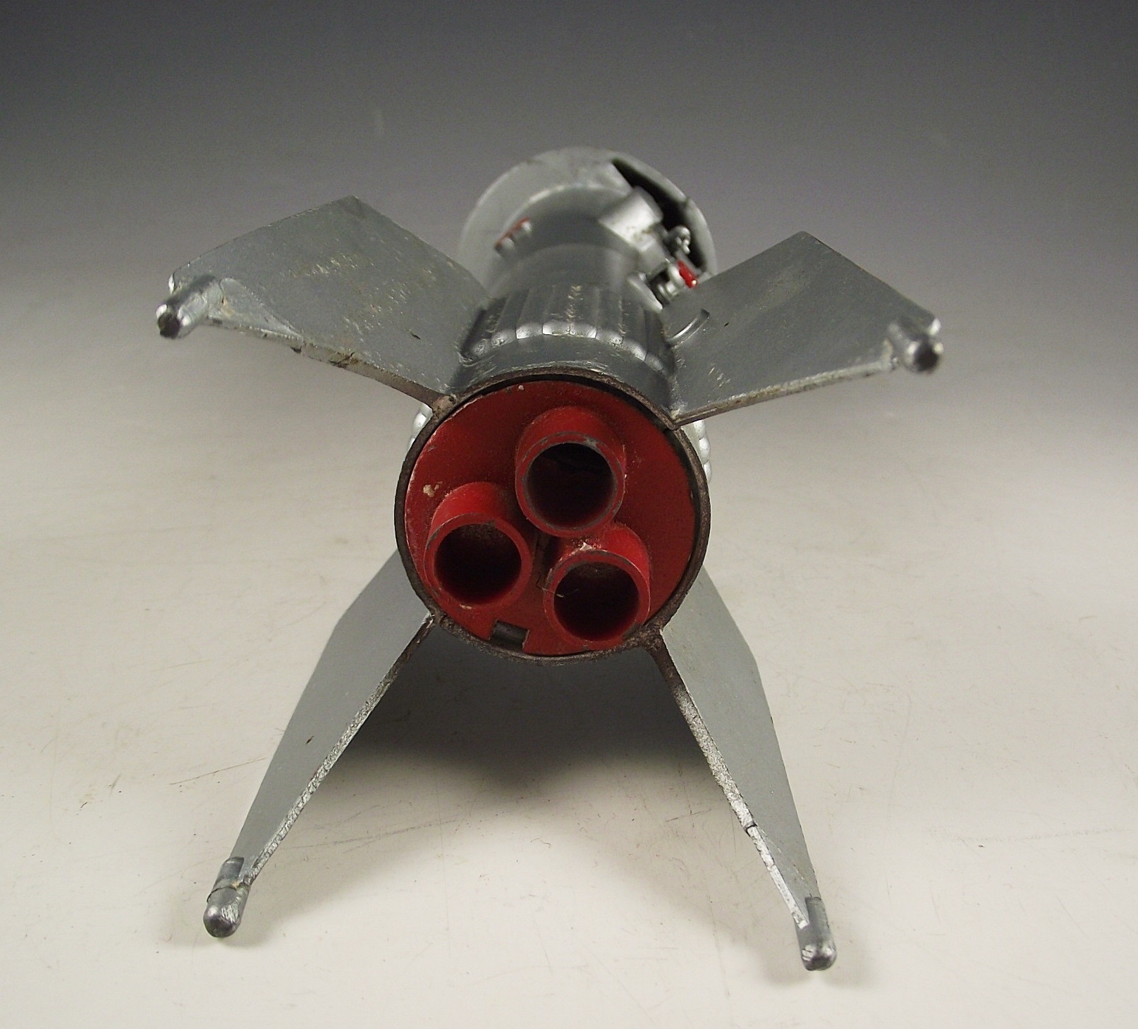 1957 Astro Mfg. die cast metal rocket bank.
