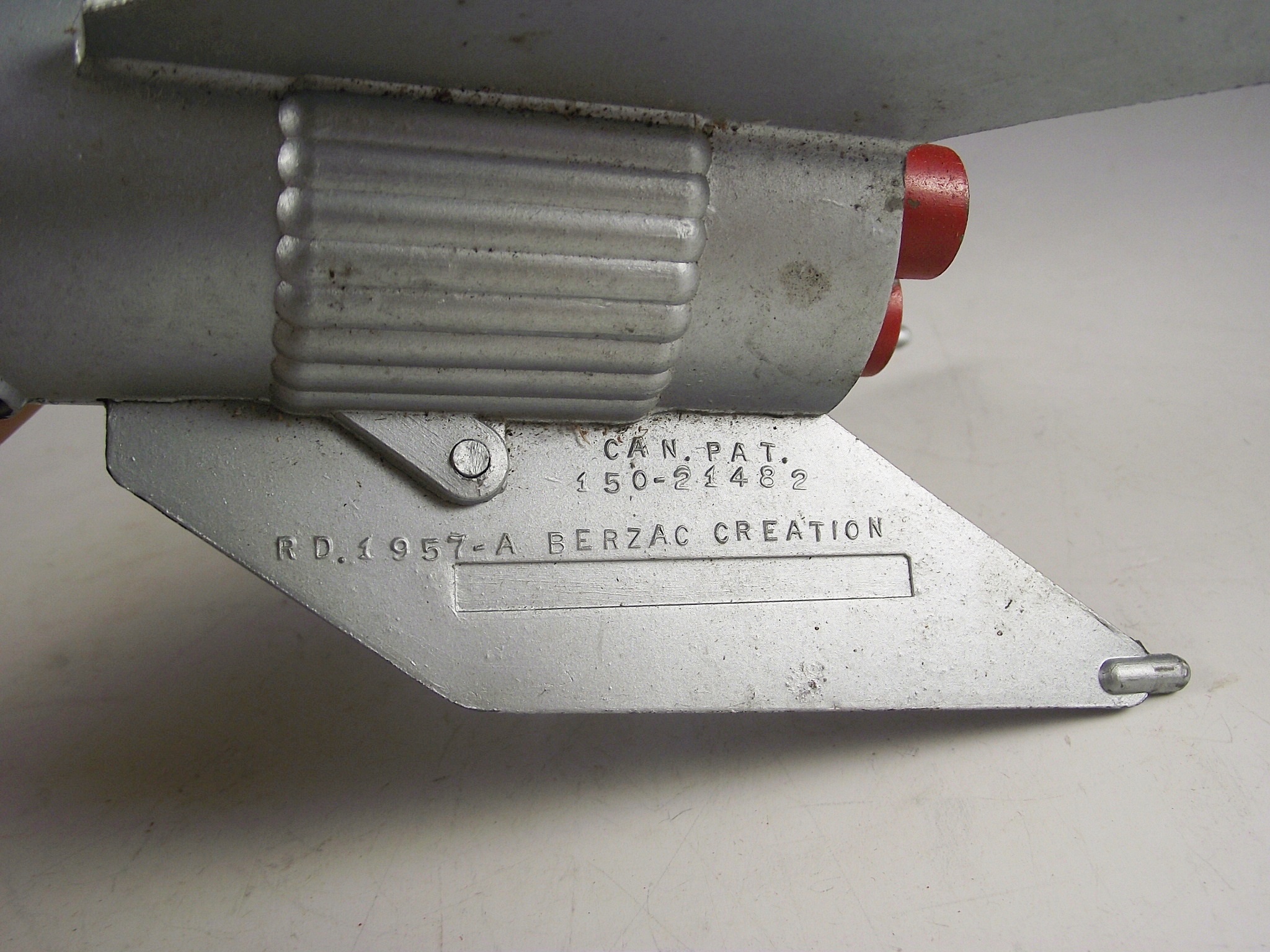 1957 Astro Mfg. die cast metal rocket bank.