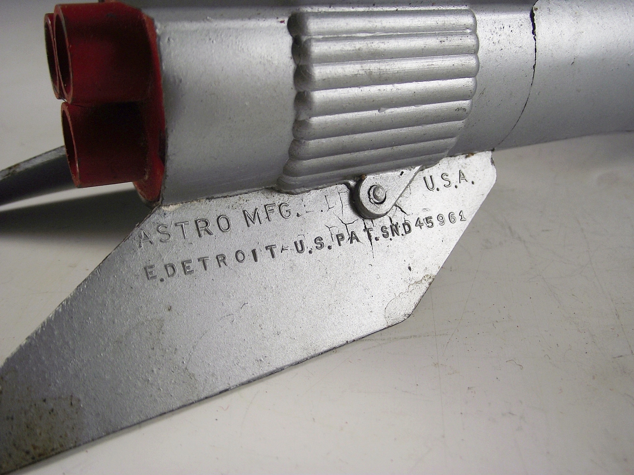 1957 Astro Mfg. die cast metal rocket bank.