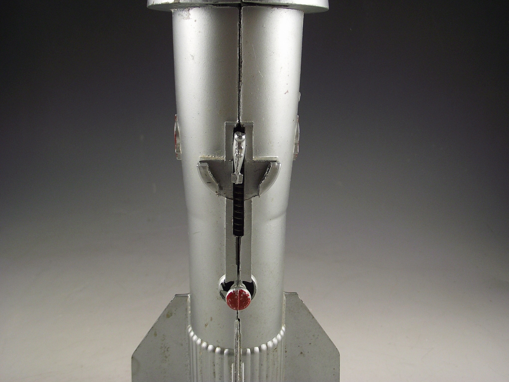 1957 Astro Mfg. die cast metal rocket bank.