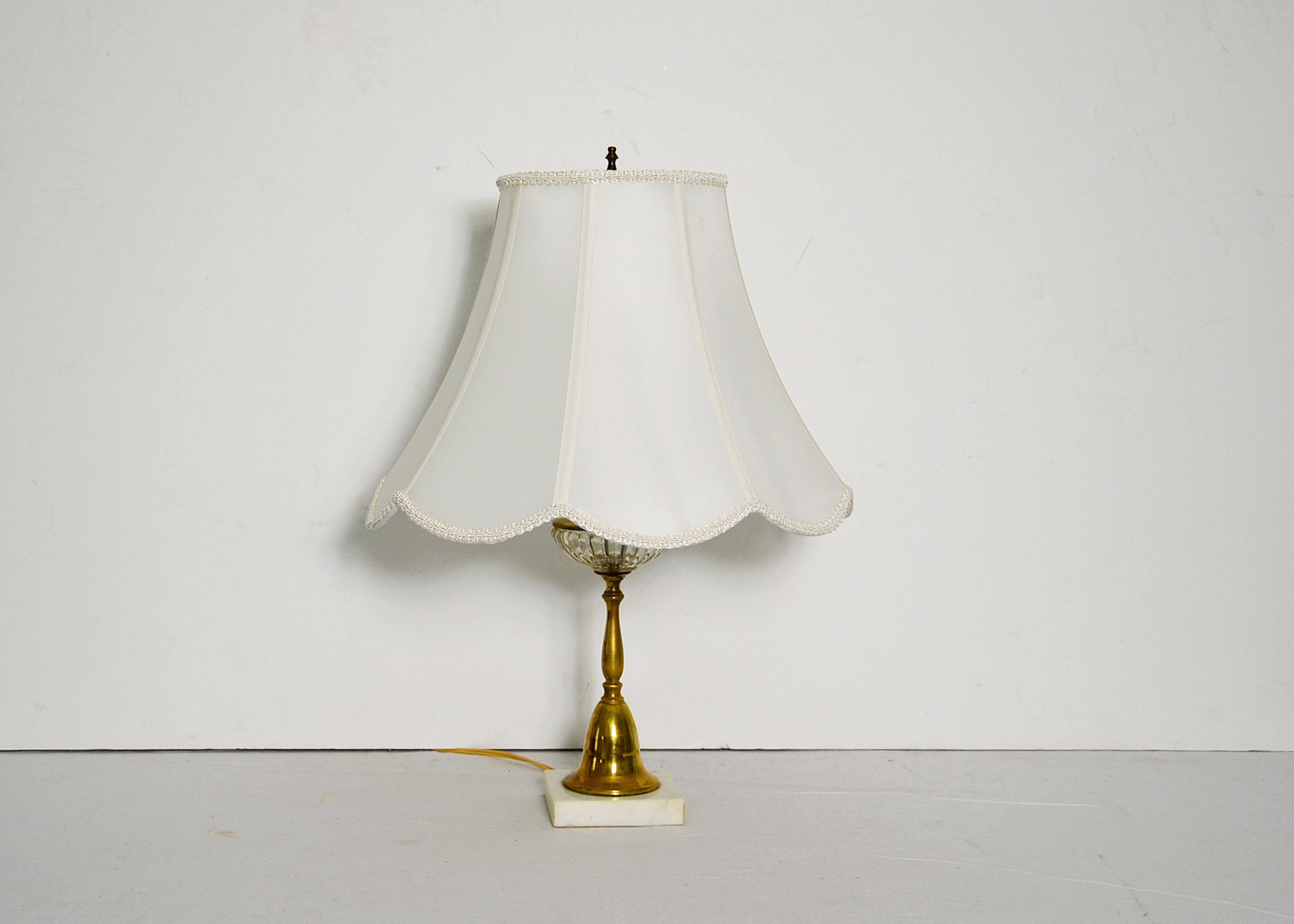 Brass candlestick lamp.