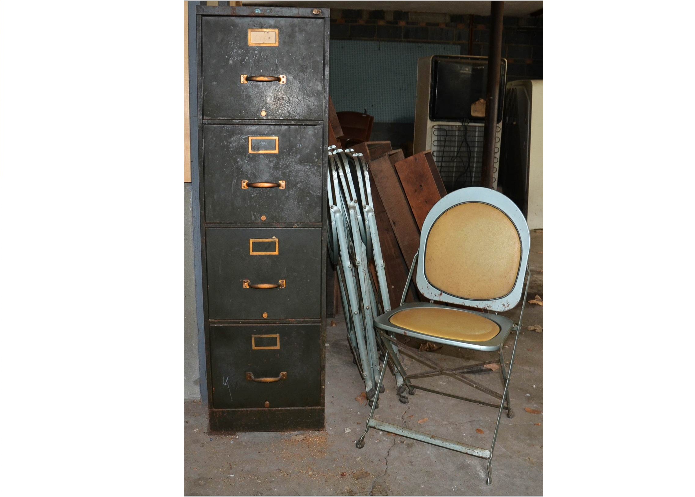 Vintage filing cabinet and folding chairs.