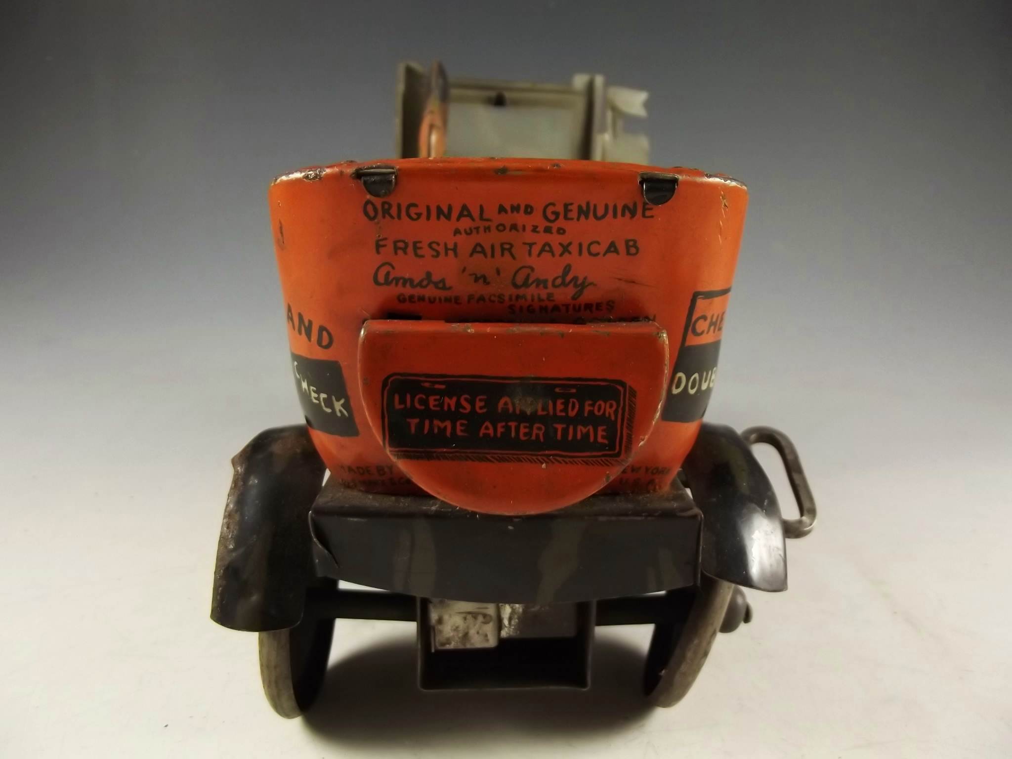Circa 1930's Amos 'n Andy tin Fresh Air Taxi Cab.