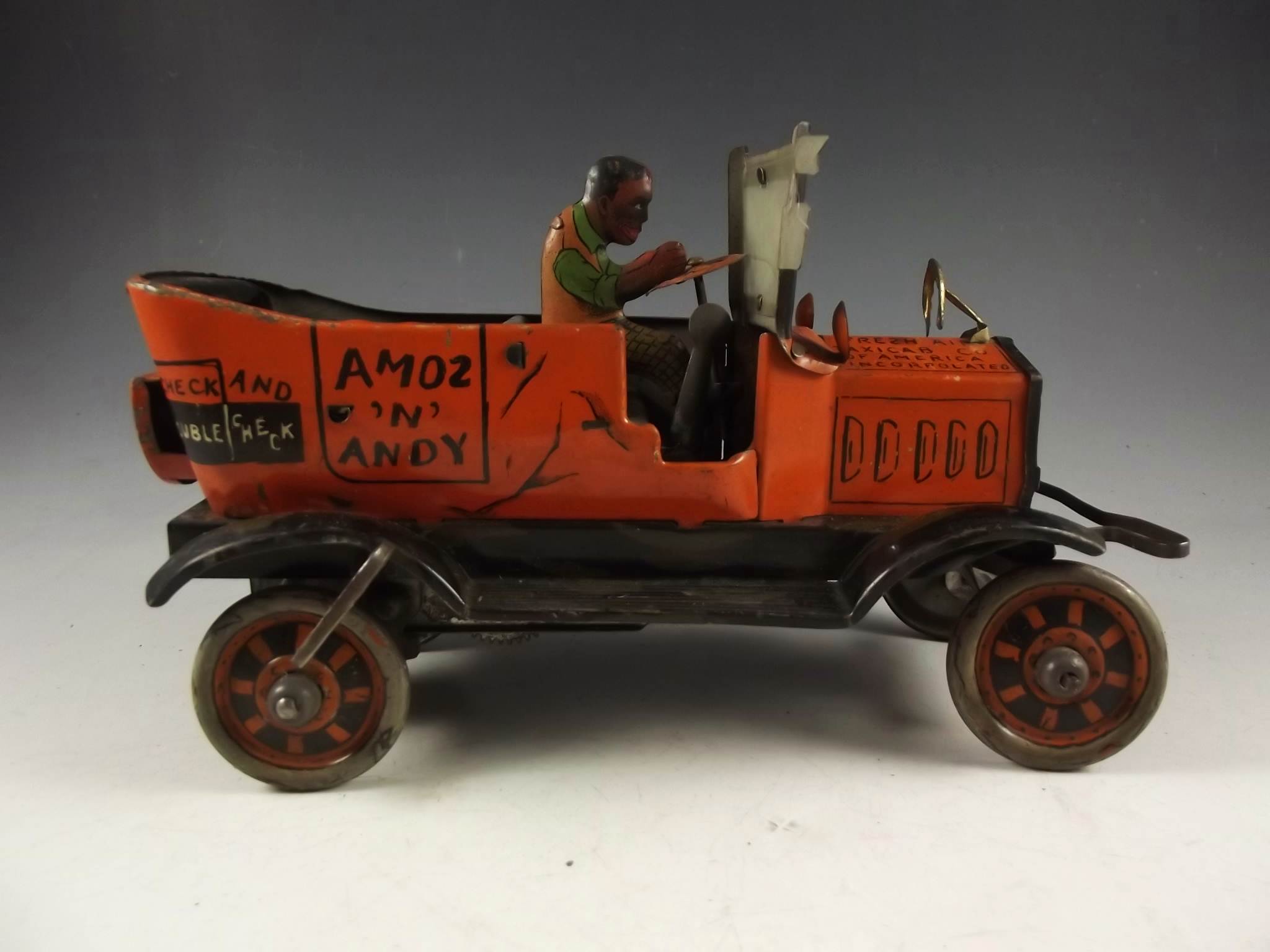 Circa 1930's Amos 'n Andy tin Fresh Air Taxi Cab.