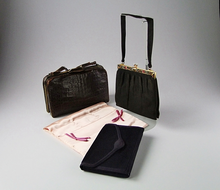 Three vintage handbags including a black purse with petit point 