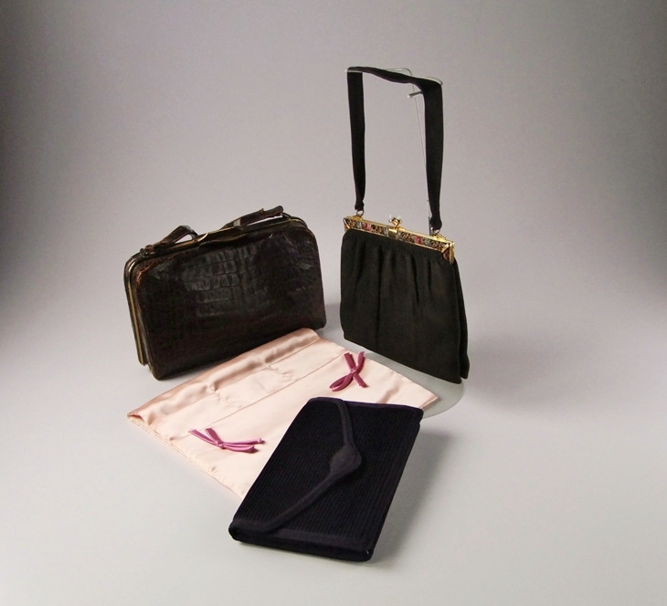 Three vintage handbags including a black purse with petit point 