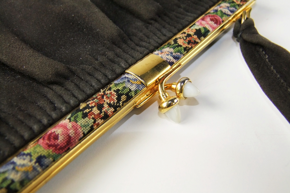 Three vintage handbags including a black purse with petit point 