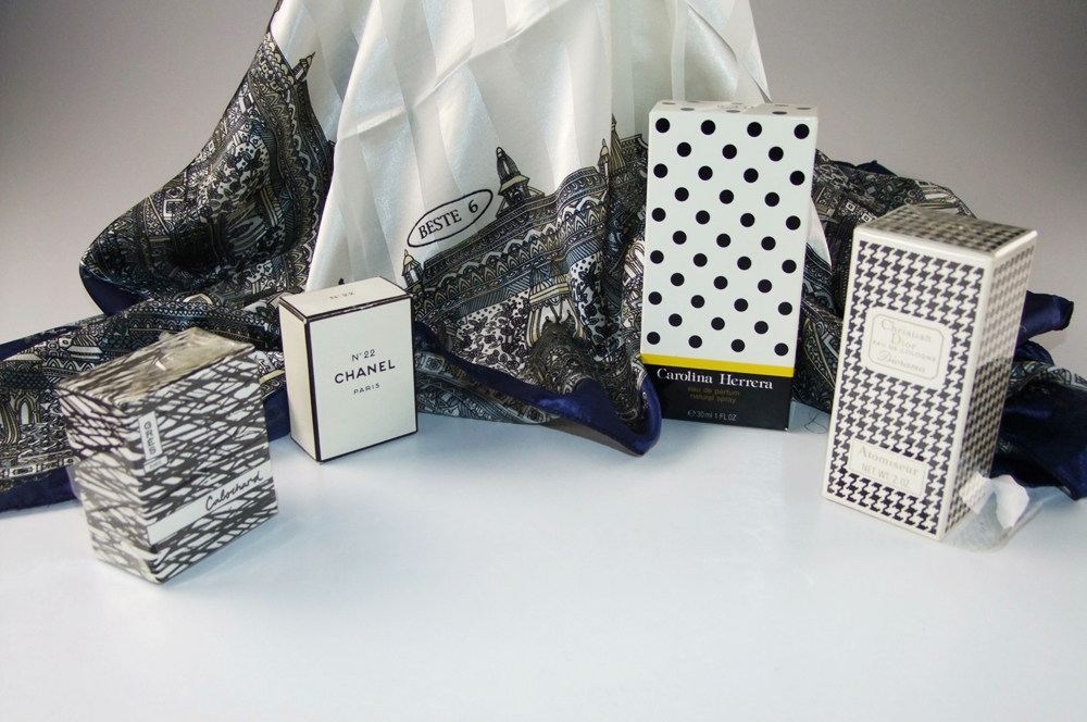 Collection of perfume including an unopened 2 oz. box of Christian Dior 