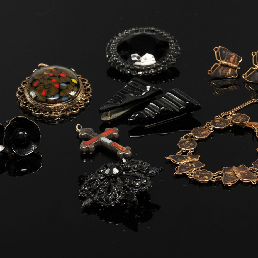 Vintage costume jewelry including a Mr. We and Har brooch
