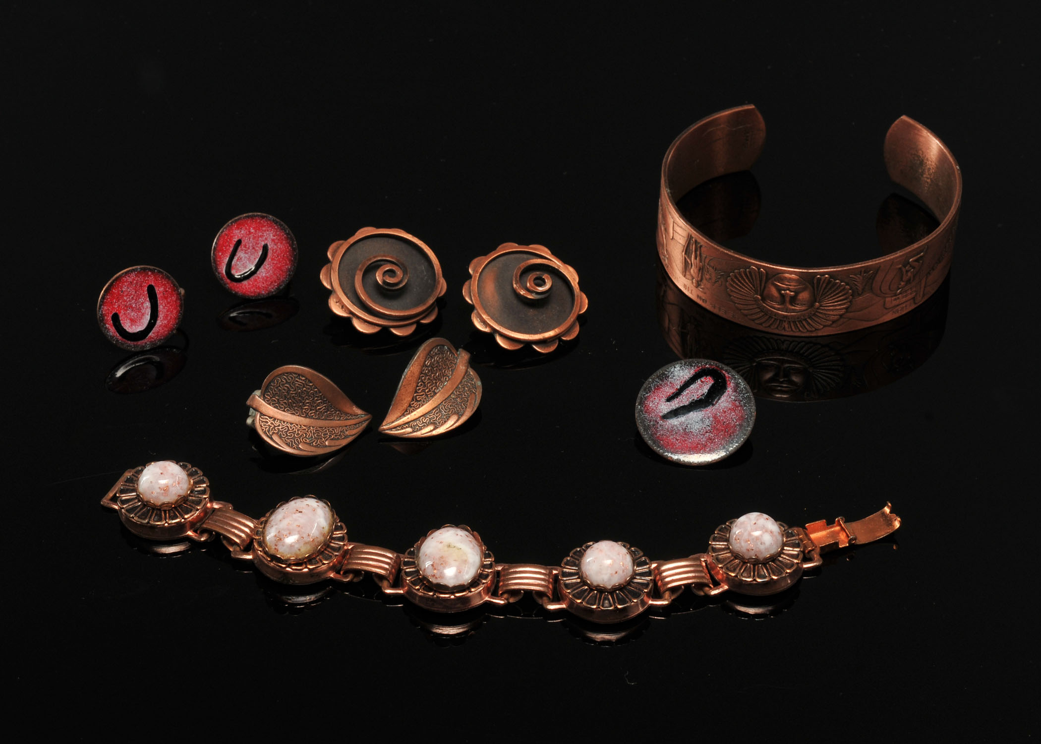 Collection of copper and enameled on copper jewelry 