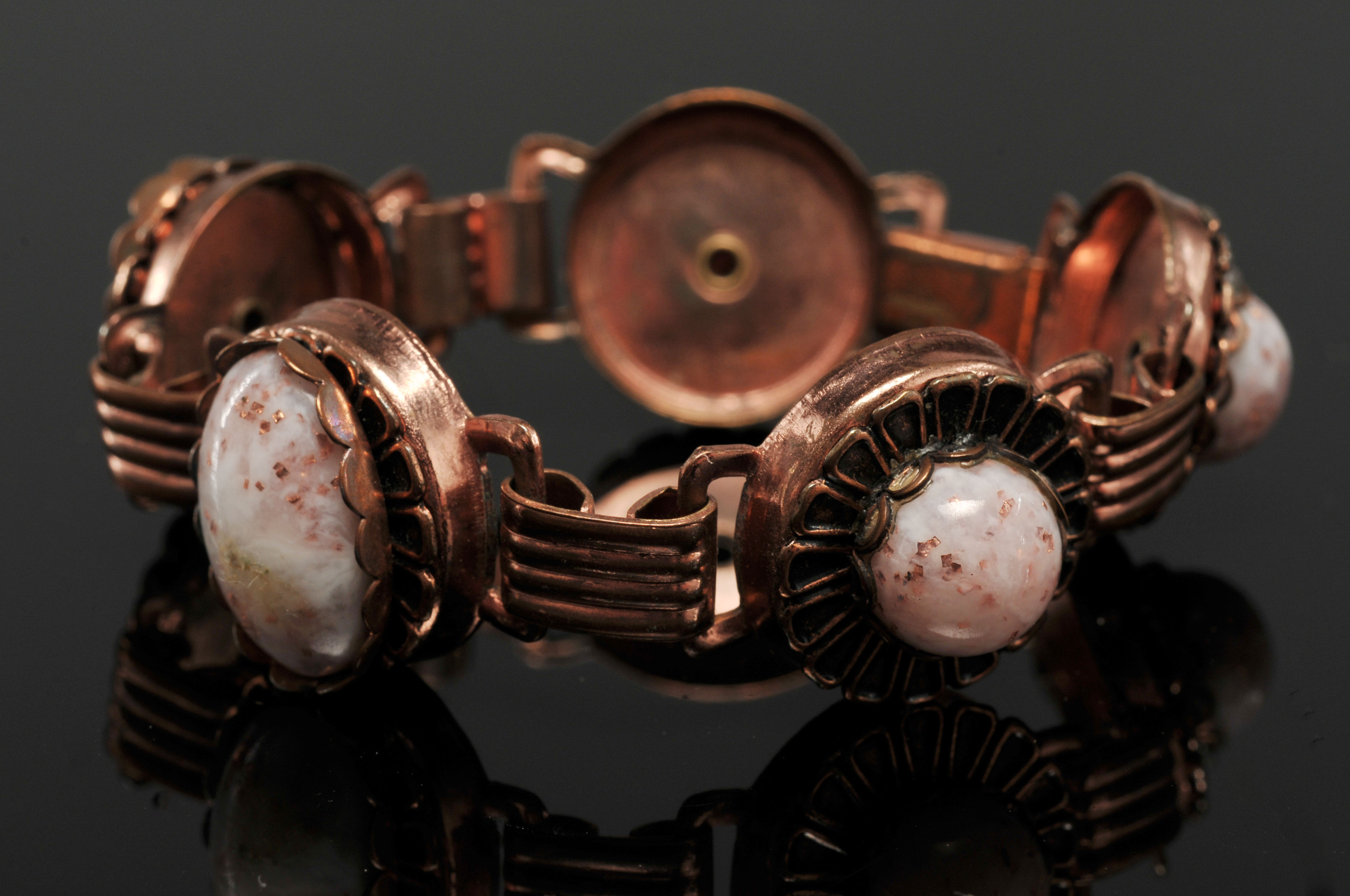 Collection of copper and enameled on copper jewelry 