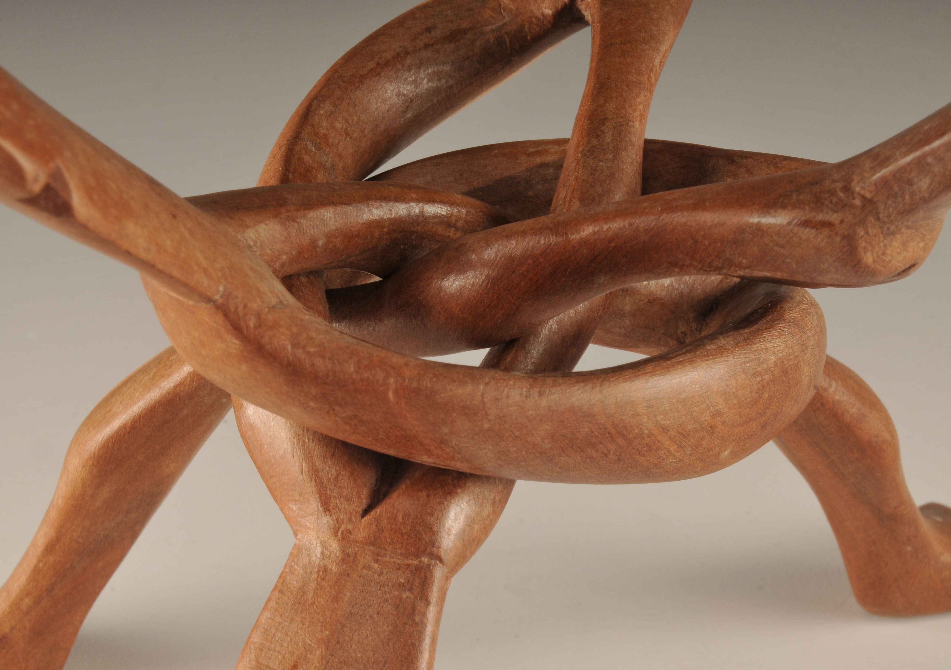  Vintage hand carved African "friends" sculpture of three intertwining figures with head dresses