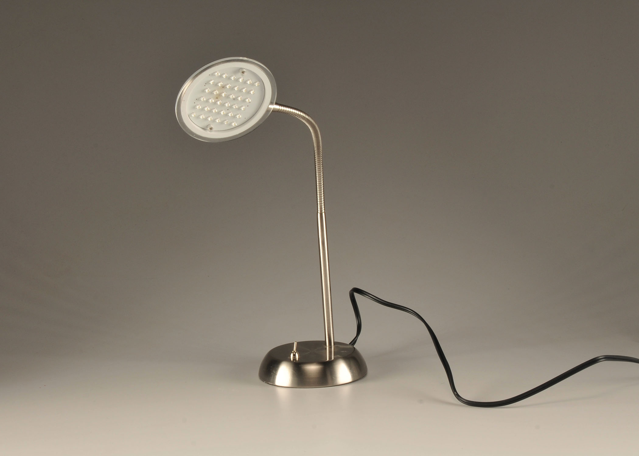  Modern portable lamp in stainless steel with bendable coiled stem 