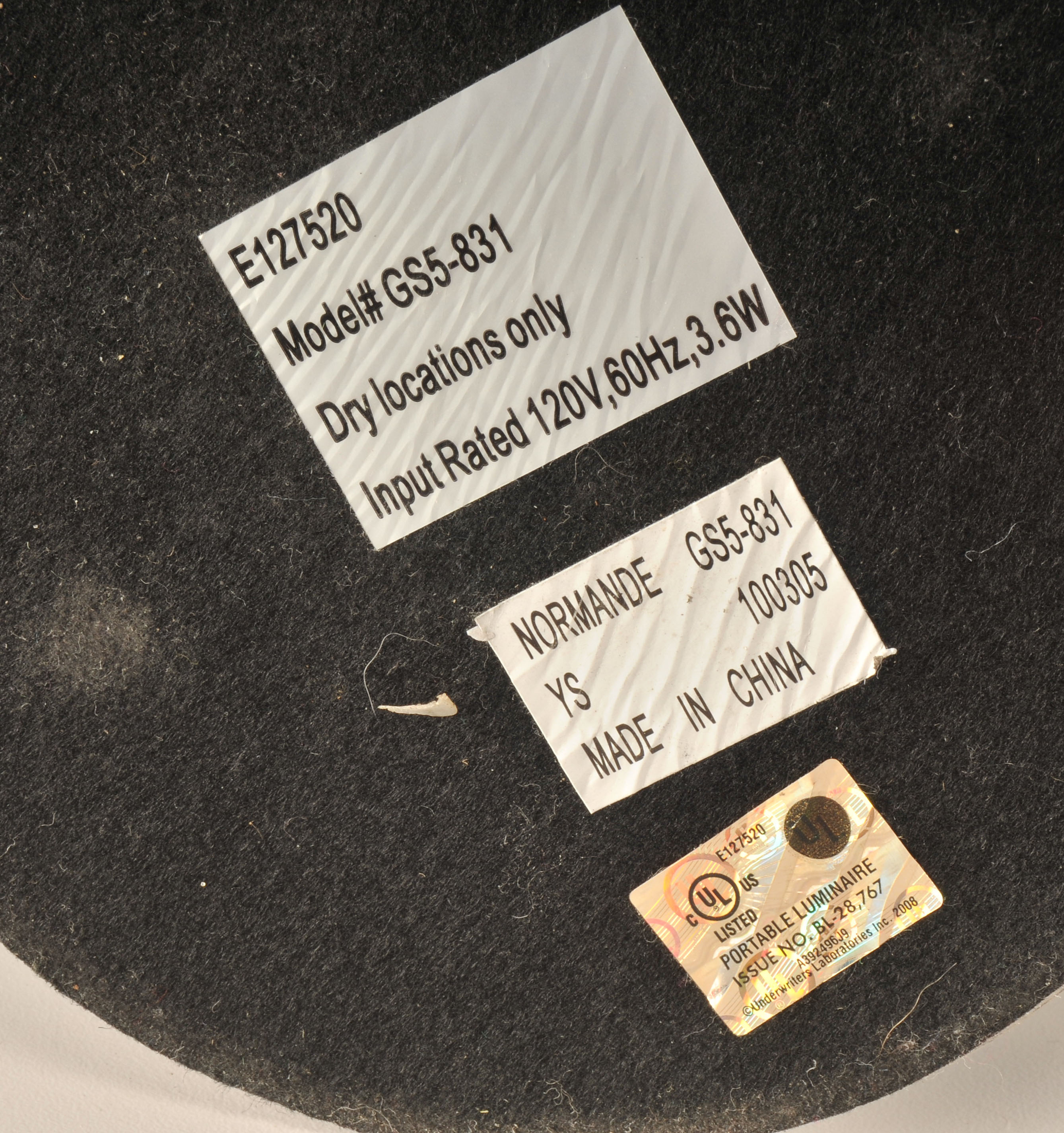  Modern portable lamp in stainless steel with bendable coiled stem 