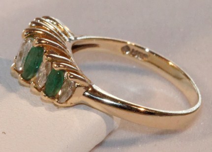 Stunning 14K Gold Ring with alternating marquise cut Diamonds and emeralds