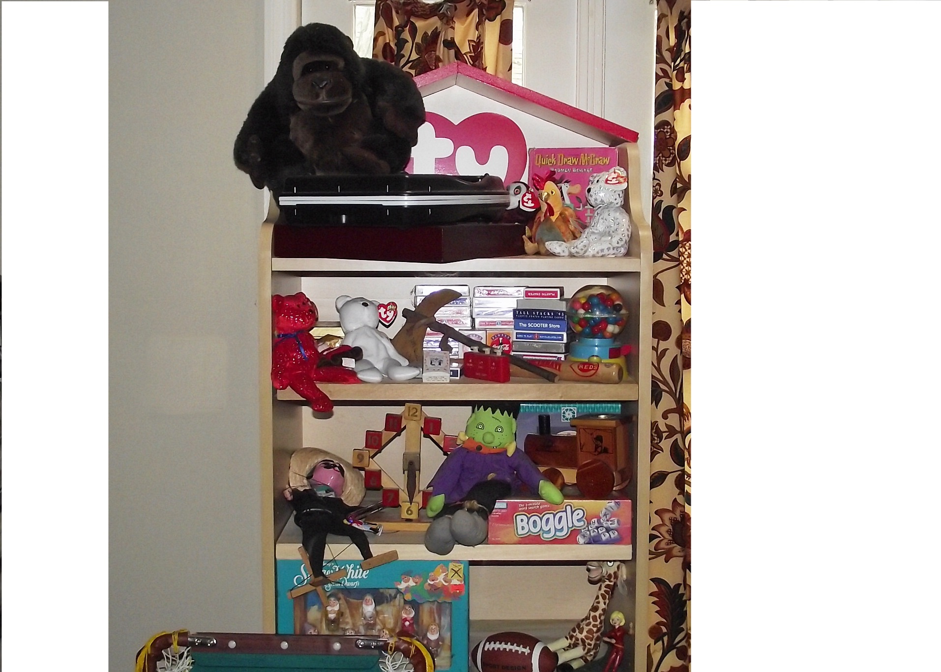 Group of toys and TY shelving unit.