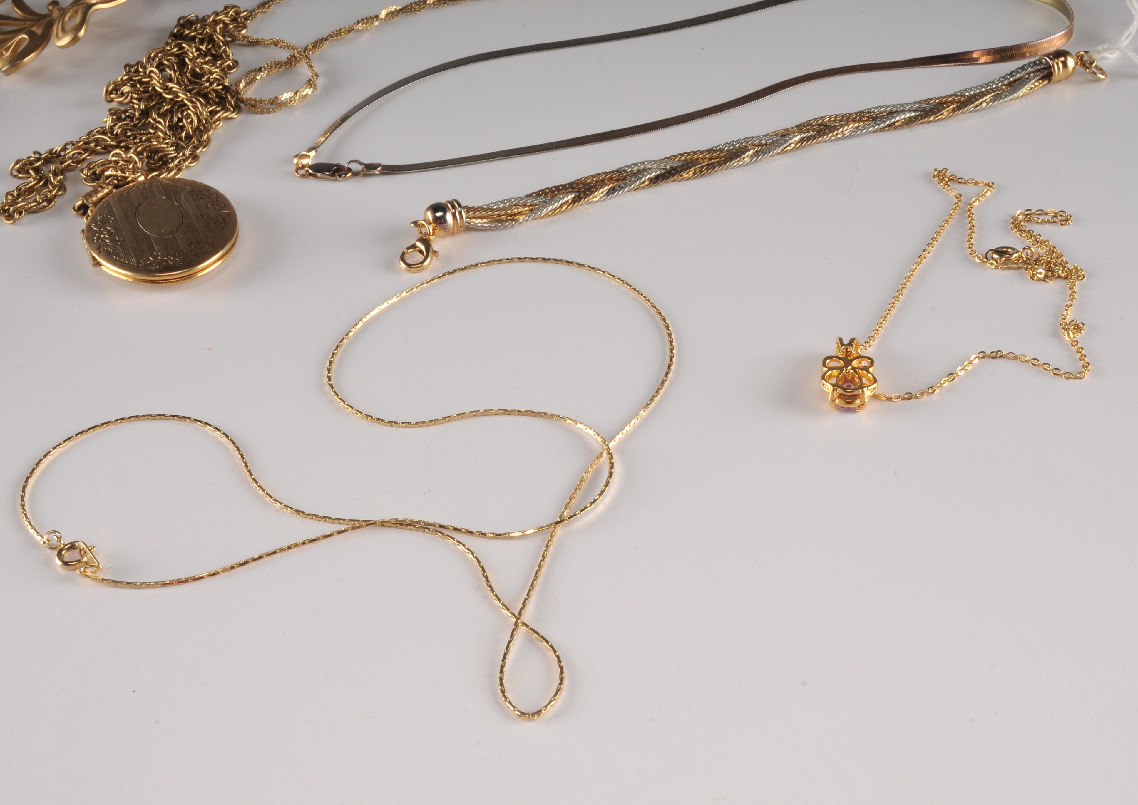Assorted Gold Tone Costume Necklaces.