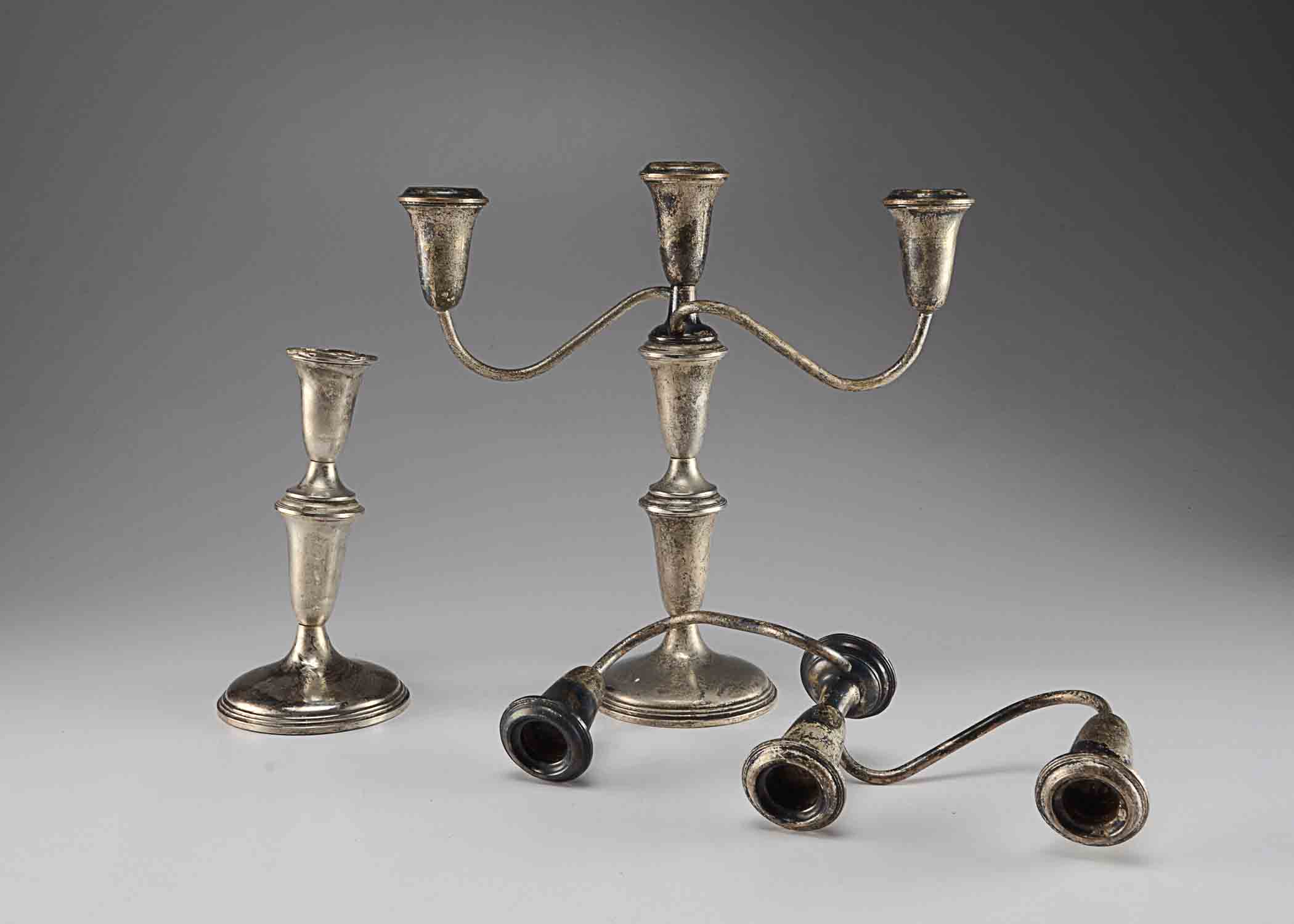 Two Weighted Silver Candelabras