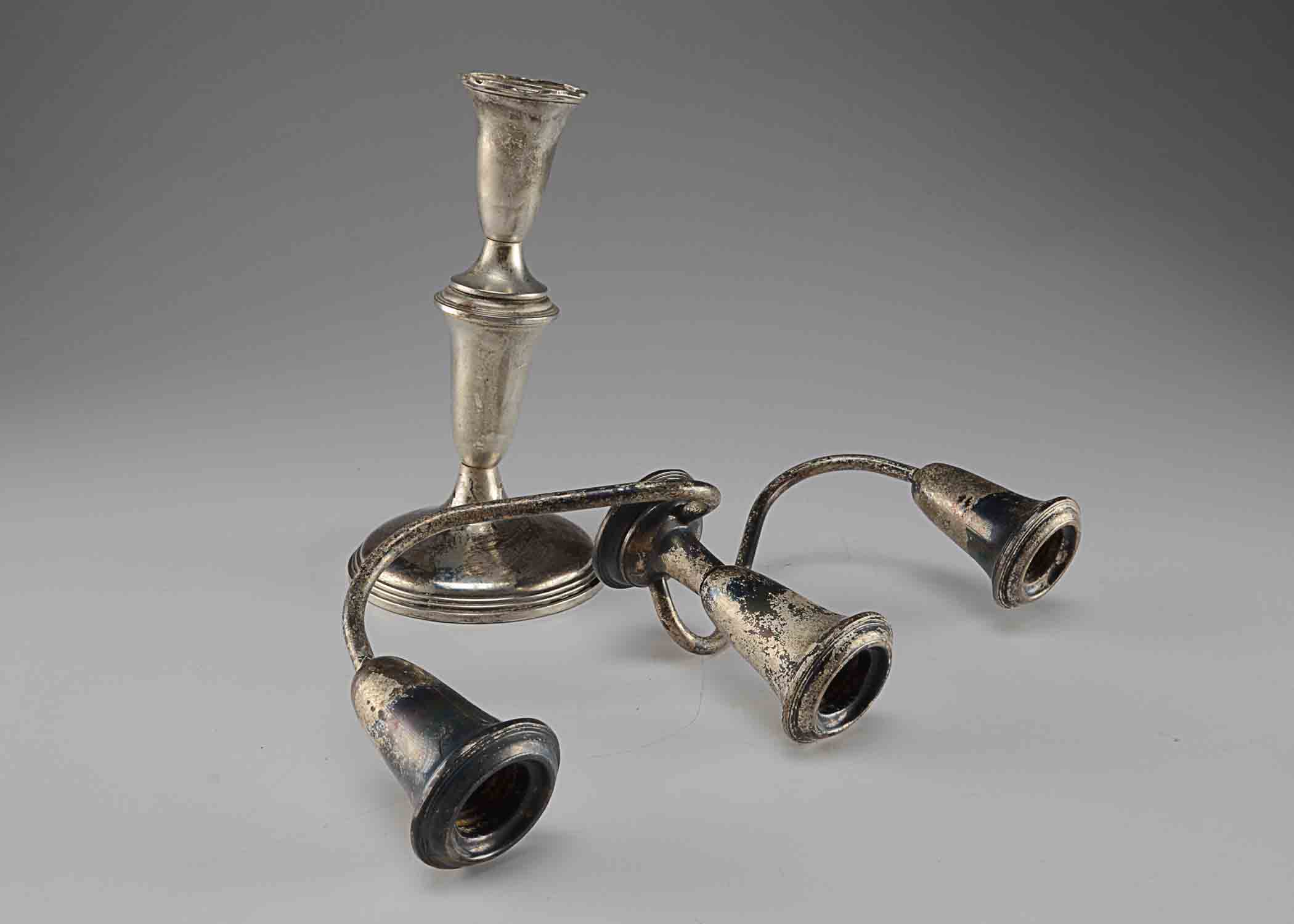 Two Weighted Silver Candelabras