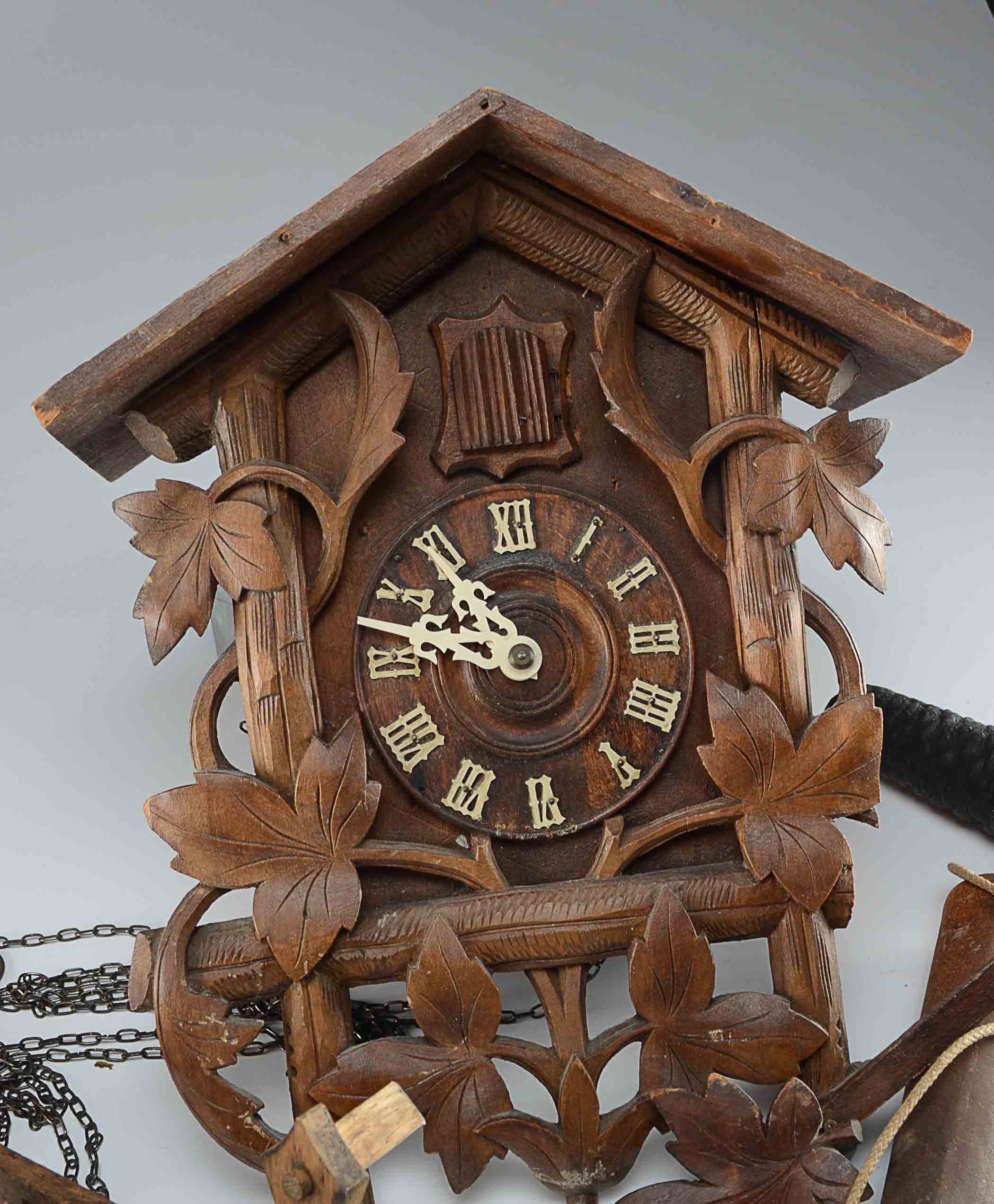 A Swiss Buco 1670 Wall Clock and A Wood Cuckoo Clock.