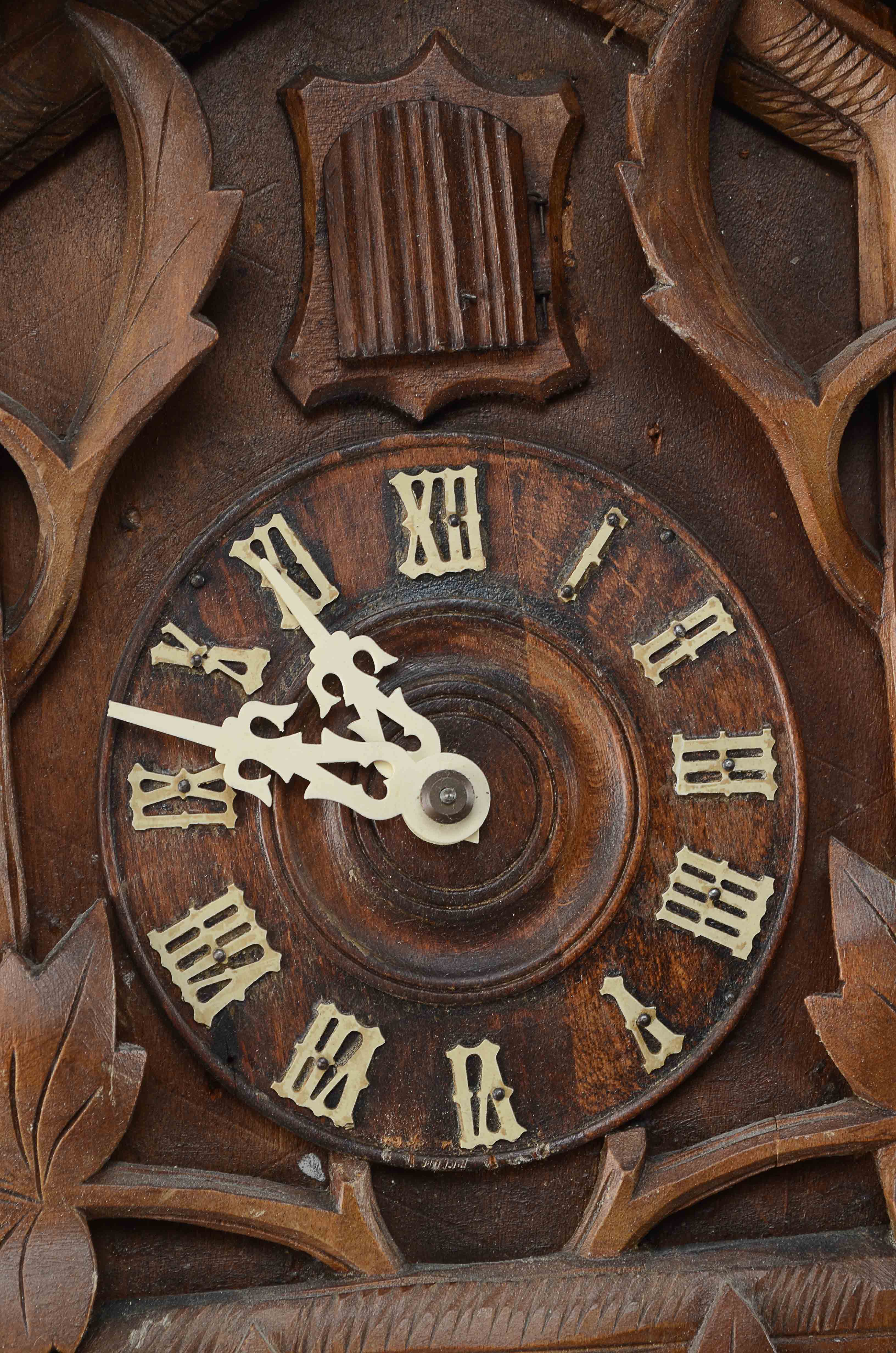 A Swiss Buco 1670 Wall Clock and A Wood Cuckoo Clock.
