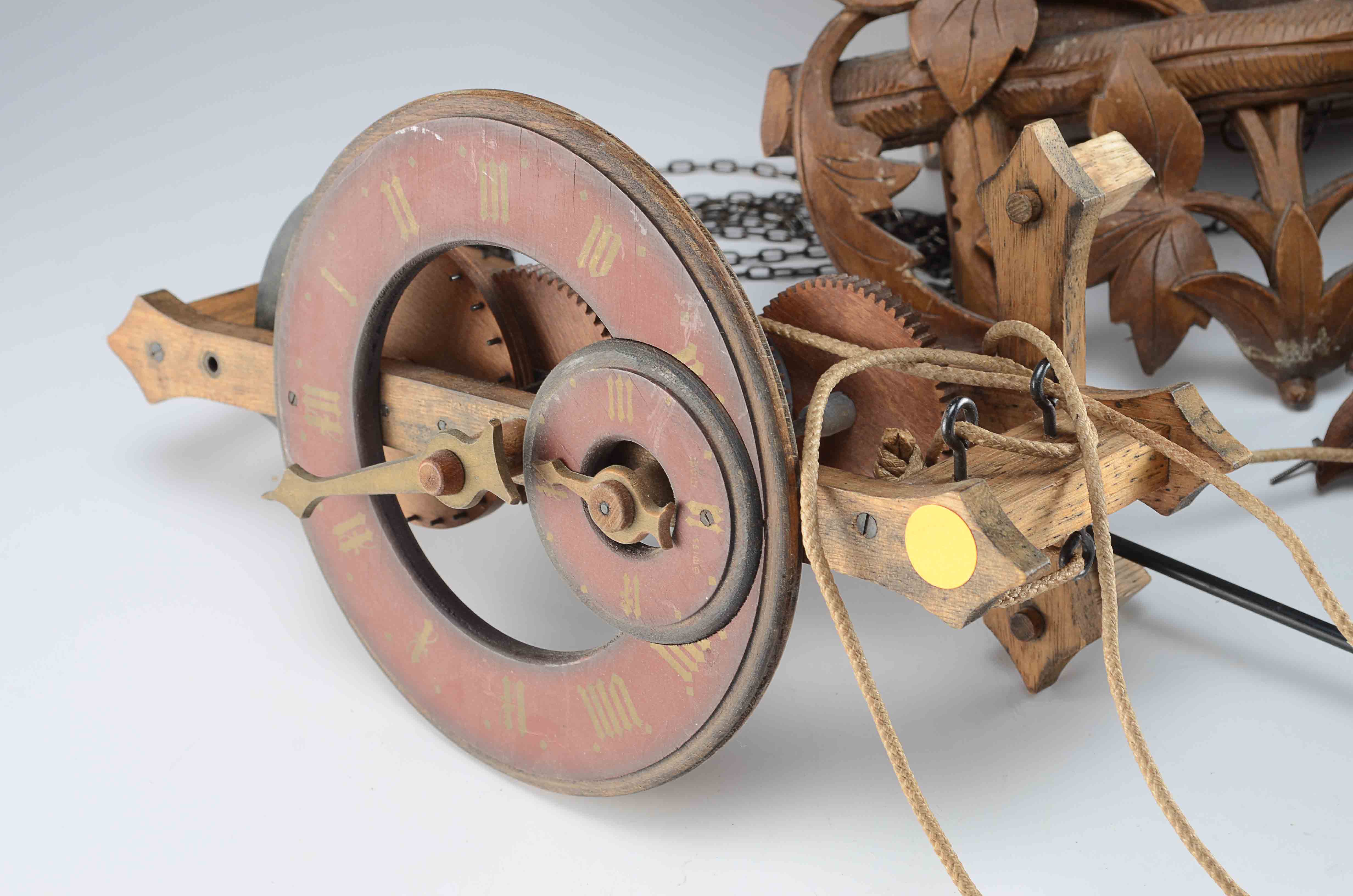 A Swiss Buco 1670 Wall Clock and A Wood Cuckoo Clock.