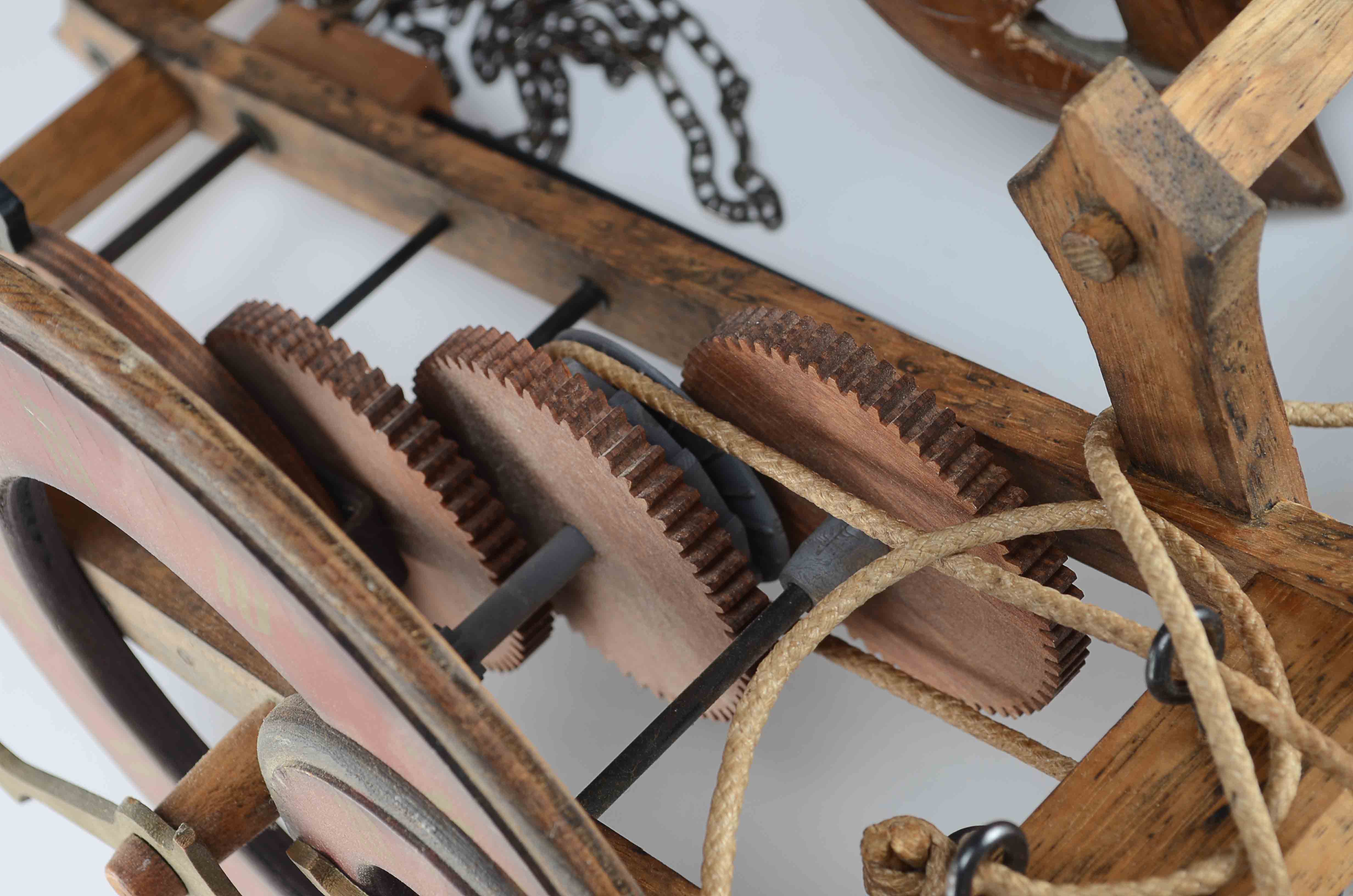 A Swiss Buco 1670 Wall Clock and A Wood Cuckoo Clock.