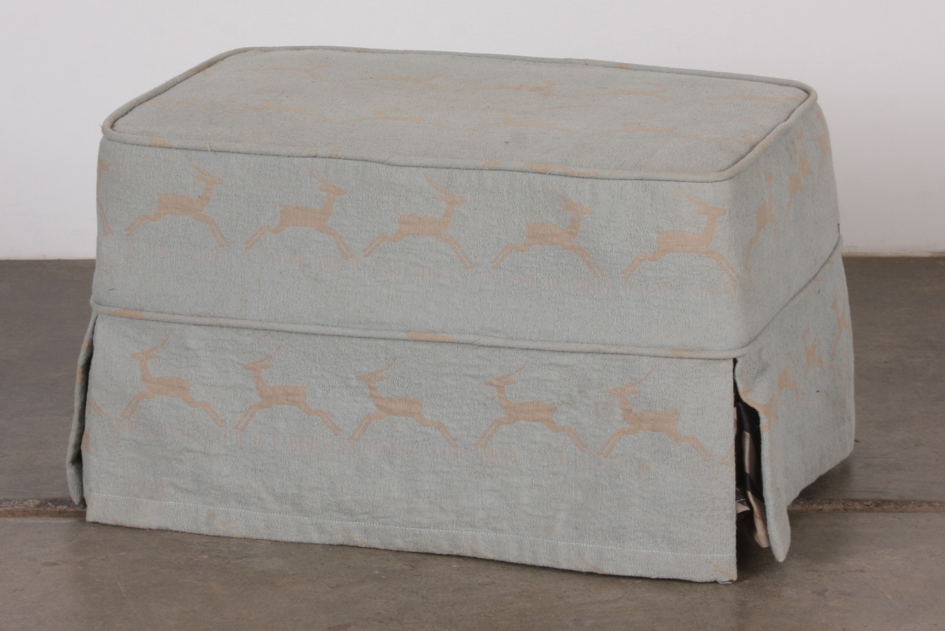 Upholstered Small Ottoman on Caster Wheels