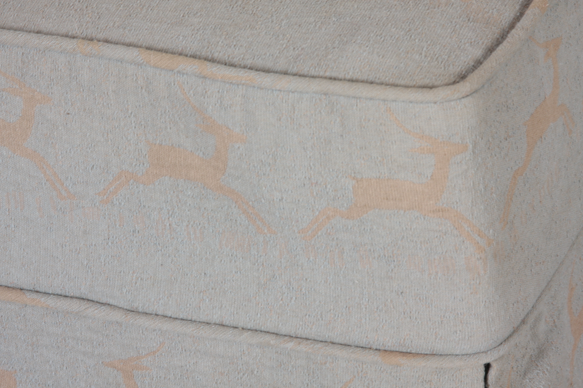 Upholstered Small Ottoman on Caster Wheels