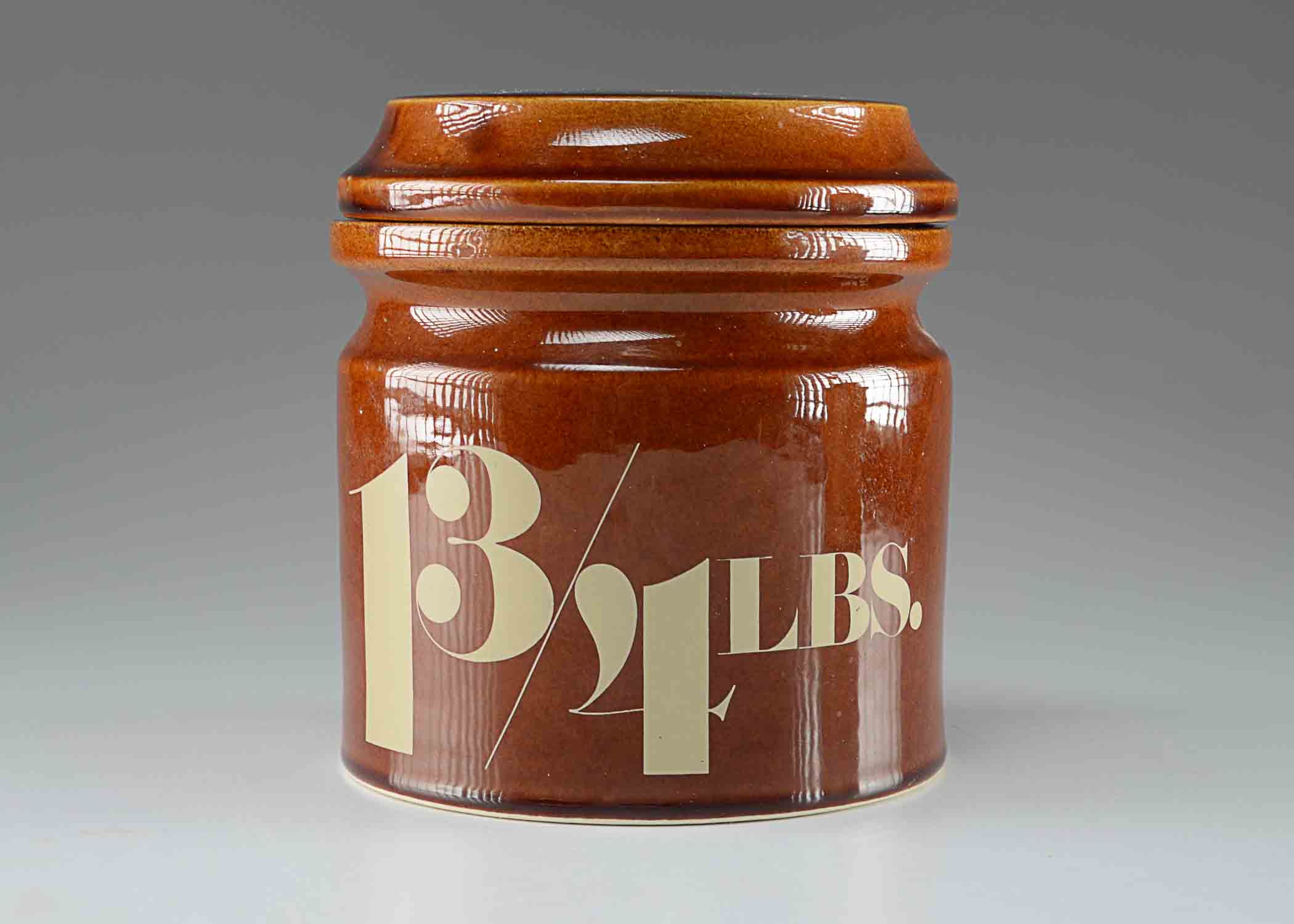 A Vintage Aramis Brown Stoneware Jar with lid.