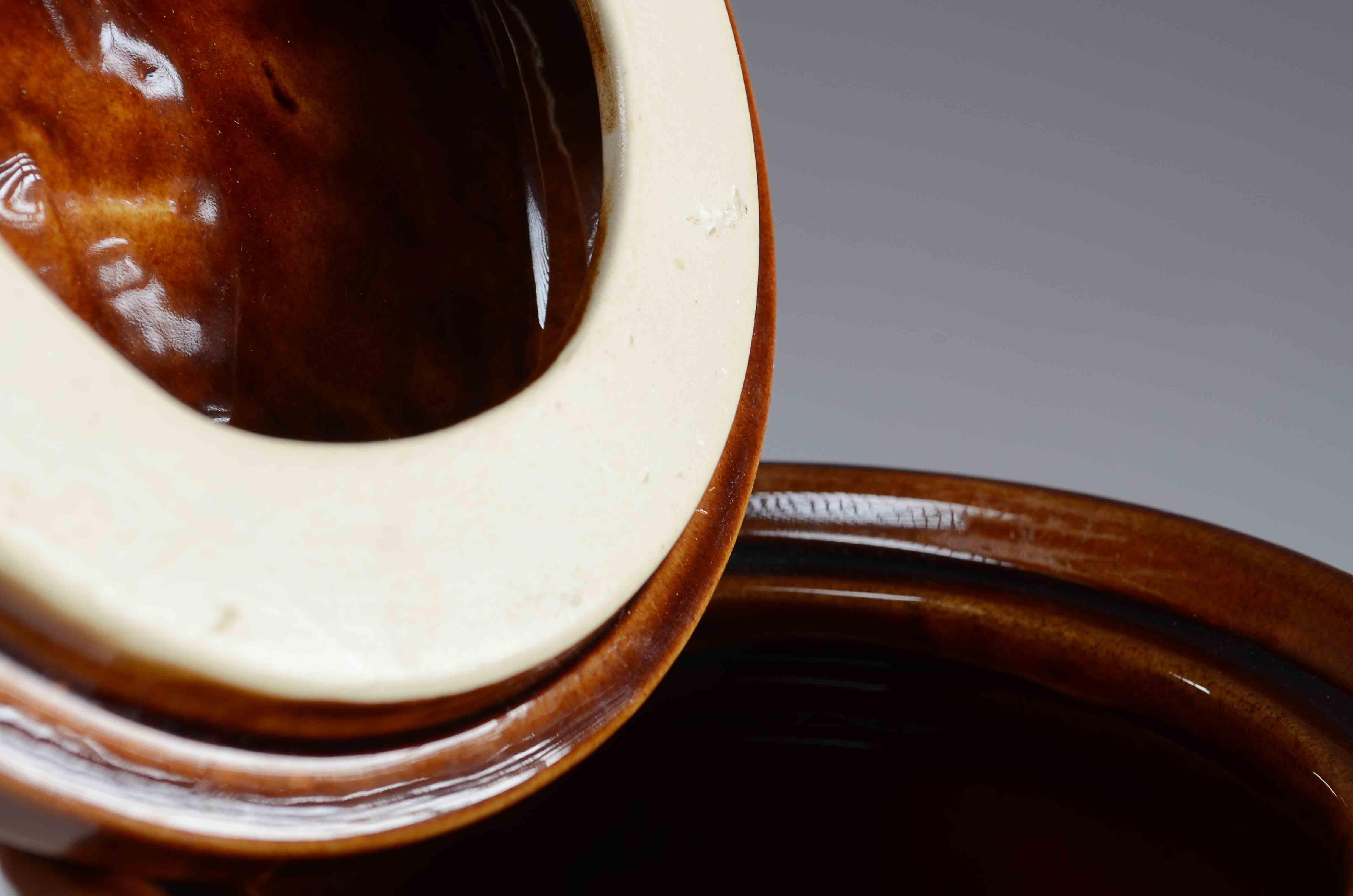 A Vintage Aramis Brown Stoneware Jar with lid.