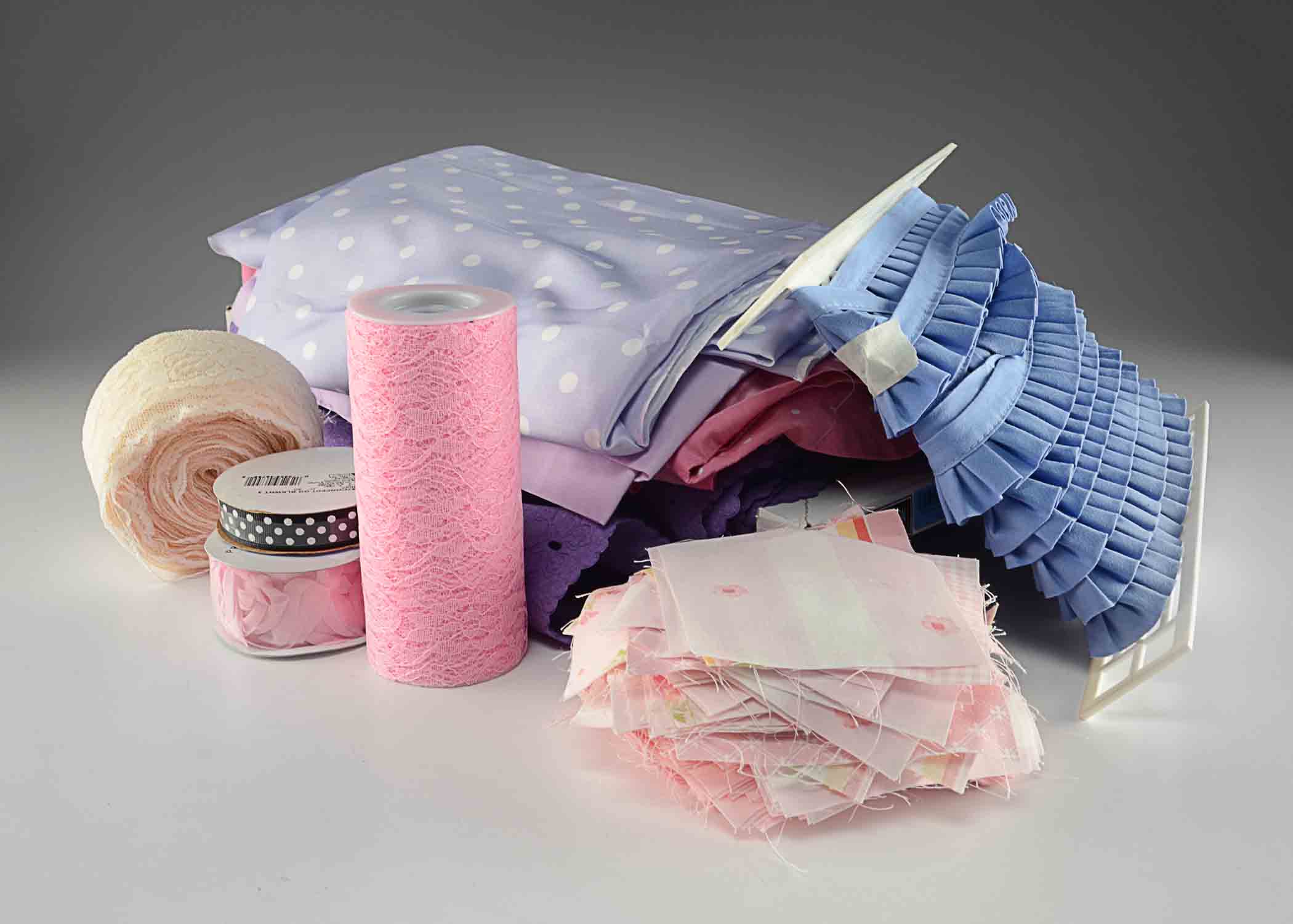 Quilting Squares, Fabric and Sewing Ribbon.